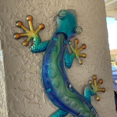 Pair of large bright, metallic gecko exterior wall art