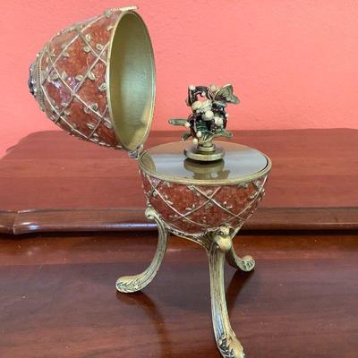 Enameled brass egg music box