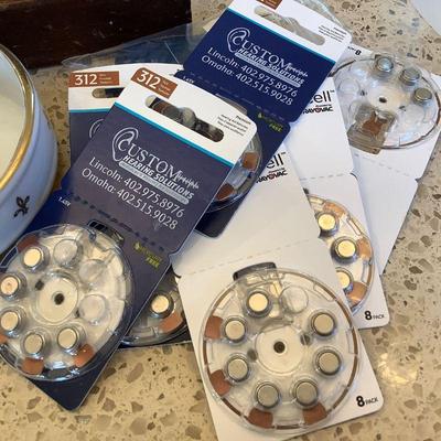 Hearing aid and batteies