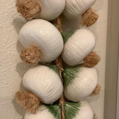 Ceramic and rope hanging onions