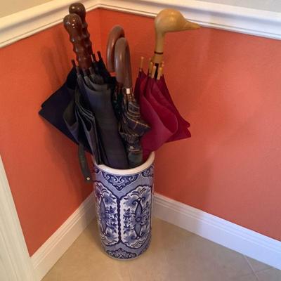 Collection of Ralph Lauren golf umbrellas and holder