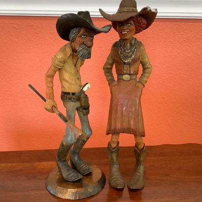 Cowboy and cowgirl sculptures