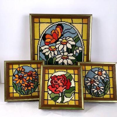 ELDA224 Mid Century Modern Floral Hand Embroidered	4 floral embroidered art pieces. All come in wooden frames with a gold trim.
