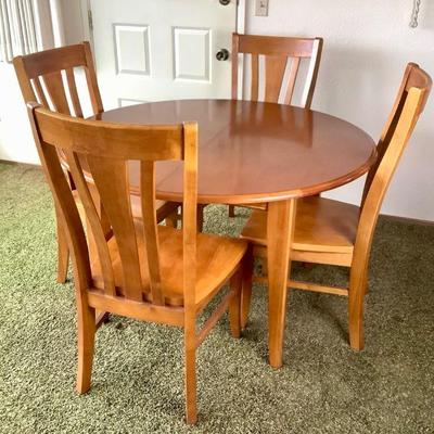 ELDA204 Vintage Round Table With Chairs	Solid wood round table with 4 chairs and also comes with a leaf. Table looks to in great...