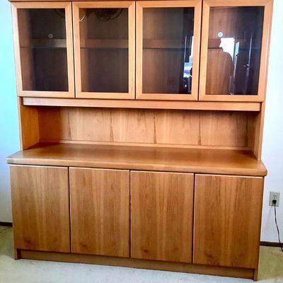 ELDA209 Vintage Teak Buffet Hutch	2-piece buffet hutch, top does separate from the bottom.Â 
