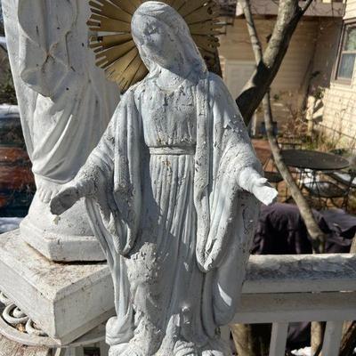 Virgin Mary Statue On A Column Base
