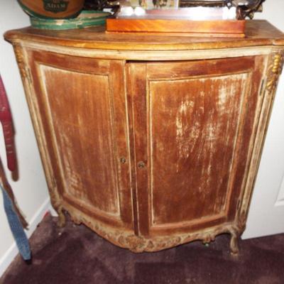 DISTRESSED CURVED FRONT DOORED CABINET AND MIRROR