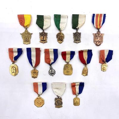 These are unmarked but are New Britain HS marching band medals, circa 1940's