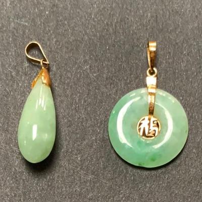 Jade w/ 14 k gold. Round jade on right w/ Chinese â€œ good fortune â€œ character