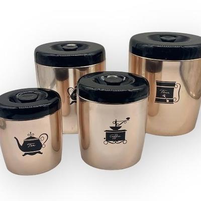 Westbend copper colored aluminum canister set. We find these often scratched up. This one in excellent cond.