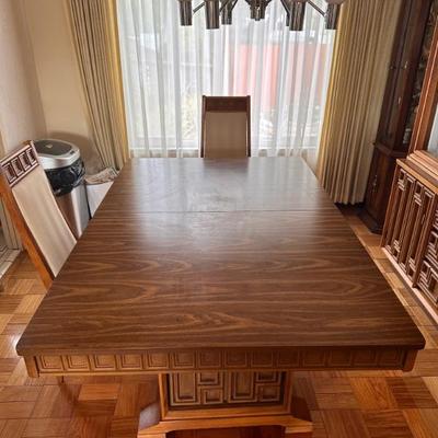 Mcm dining table by  Penthouse