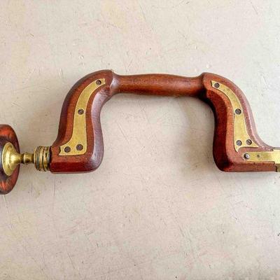 Brass Plated wooden brace, unknown maker