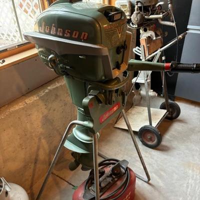 1950's Johnson boat with matching stand and gas can