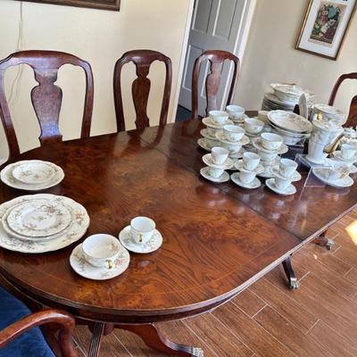 Dining table with two leaves and eight chairs (chairs have removable seats for easy recovering)