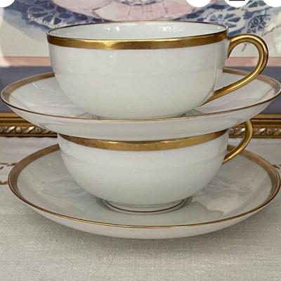 Antique Charles Ahrenfeldt Limoges Depose- pair cups with saucers, white with 22kt gold trim