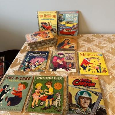 Vintage childrenâ€™s books including Little Golden Books