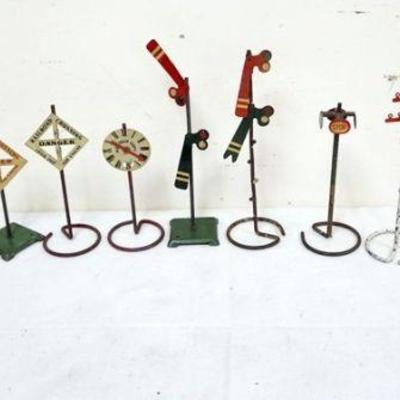 1213	GROUP OF ASSORTED TRAIN O GAUGE METAL SIGNS
