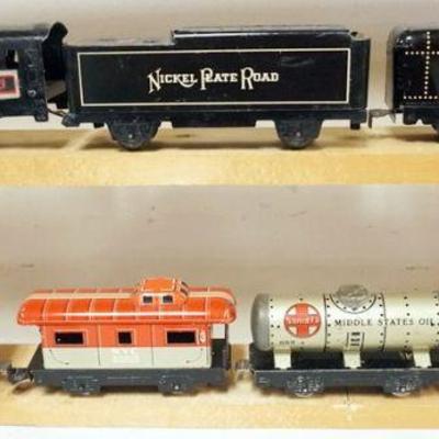 1166	MARX O GAUGE TRAIN, LOCOMOTIVE WITH TENDER AND 5 CARS
