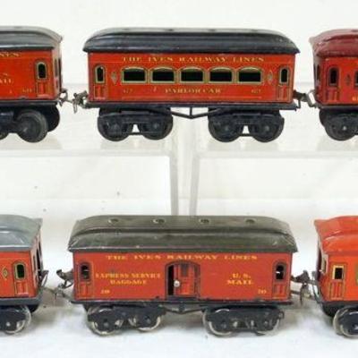 1057	IVES TRAIN O GAUGE  GROUP OF 6 CARS, #60 BAGGAGE, #62 PARLOR DRAWING ROOM, #70 BAGGAGE, #71 CHAIR
