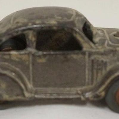 1230	ANTIQUE CAST IRON TOY CAR, APPROXIMATELY 5 IN X 2 IN H
