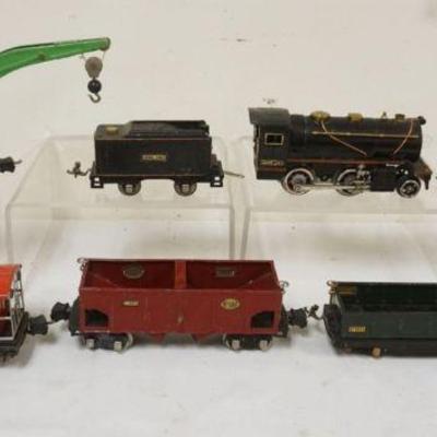 1081	LIONEL TRAIN O GAUGE #257 LOCOMOTIVE WITH #257B TENDER  WITH 5 CARS. #2810 CRANE, SEARCH LIGHT CAR, #812, #816 HOPPER, #2817 CABOOSE
