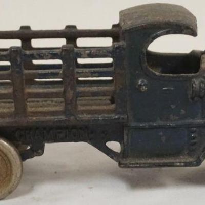 1239	ANTIQUE CAST IRON TOY STAKE BODY TRUCK, APPROXIMATELY 8 IN X 3 1/2 IN H
