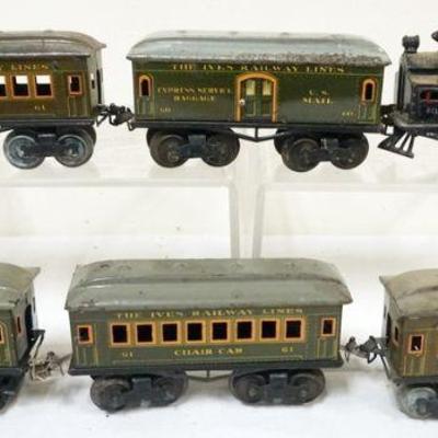 1021	IVES TRAIN O GAUGE #8217 LOCOMOTIVE WITH 5 CARS, #60 BAGGAGE, #61 CHAIR CAR, #62 Parlor 
