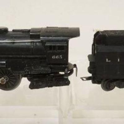 1129A	LIONEL TRAIN O GAUGE #665 LOCOMOTIVE & TENDER
