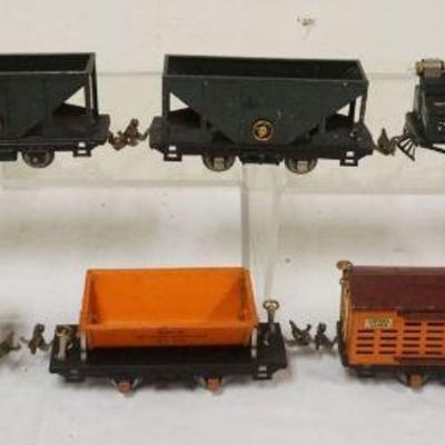 1067	LIONEL TRAIN O GAUGE #153 ENGINE WITH 7 CARS. #803, #805, #806 AND #809

