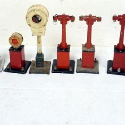 1209	GROUP OF ASSORTED TRAIN O GAUGE METAL LIGHTS
