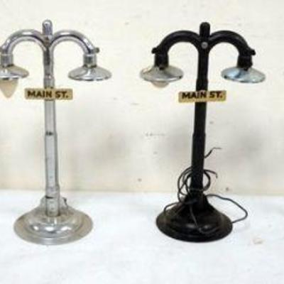 1210	GROUP OF ASSORTED TRAIN O GAUGE METAL STREET LIGHTS
