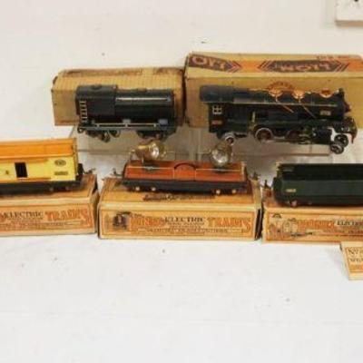 1071	LIONEL TRAIN O GAUGE #260E ENGINE WITH 5 CARS AND TENDER. #812, #814, #815, #817 AND #820. SOME WITH BOXES
