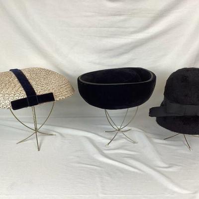 BIHY105 Vintage Women's Hats	Three vintage women's hats. Includes an Eva Mae woven hat, aÂ vintageÂ Chesterfield original hat, and a...