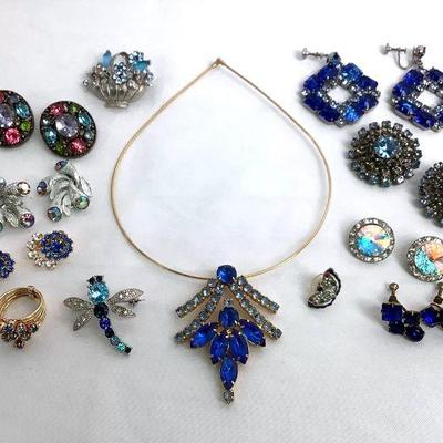 BIHY215 Vintage Blue Rhinestone Costume Jewelry	Costume jewelry of earrings, pins, necklaces and a ring. Mostly with blue rhinestones.
