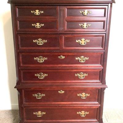 RUVE204 Bassett Tall Dresser	Made by Bassett furniture is this tall dresser with 6 drawers. Has brass like hardware. Dresser does have...