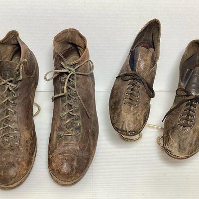 BIHY106 Early 1900's Sports Cleats	Two pairs of leather cleats

