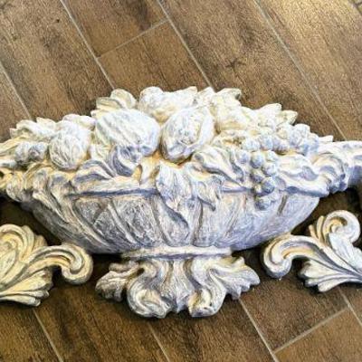 Baroque style ornate wall sculpture
