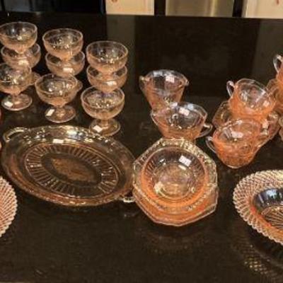 Large collection of pink depression glass to choose from