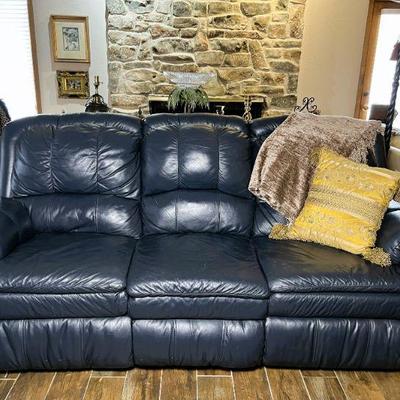Navy leather sofa w/ recliners on both ends - 84