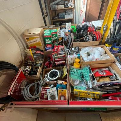 Mixed lot of tools and hardware for electrical and plumbing work. 