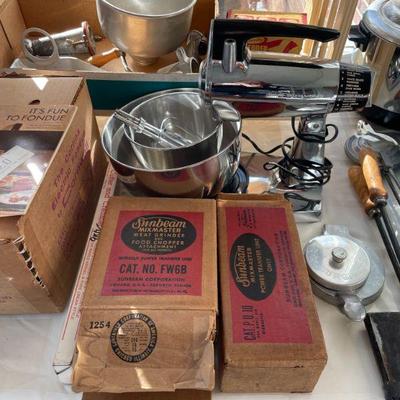 Vintage Sunbeam standing mixer and attachments.