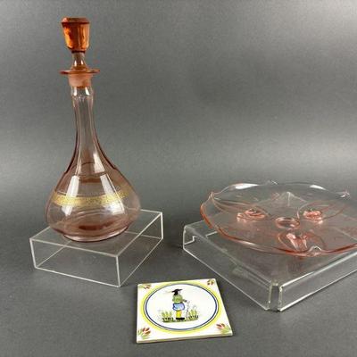Lot 1073 | Lot of Quimper Tile, Pink Glass with Stopper 