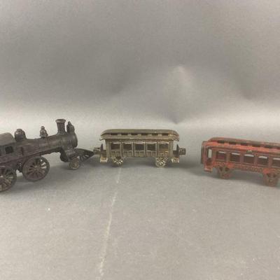 Lot 245 | Antique Cast Iron Train Cars