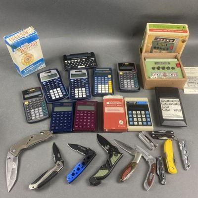 Lot 1329 | Vintage Knives , Calculators & More