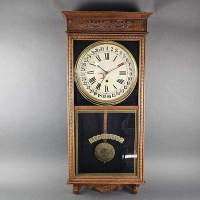 Lot 1200 | Antique Wall Calendar Regulator Clock