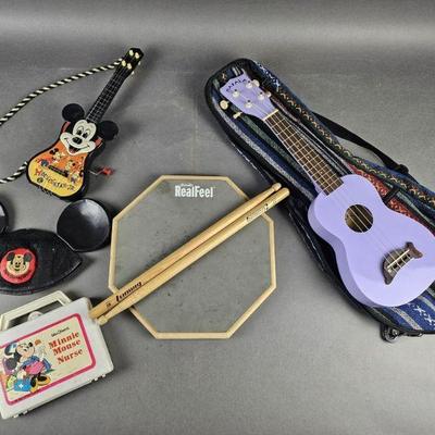 Lot 1386 | Makala Ukulele, Mousegetar-Jr. & More!