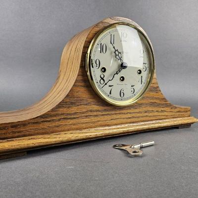 Lot 1162 | Howard Miller Oak Westchine Tamber Mantle Clock