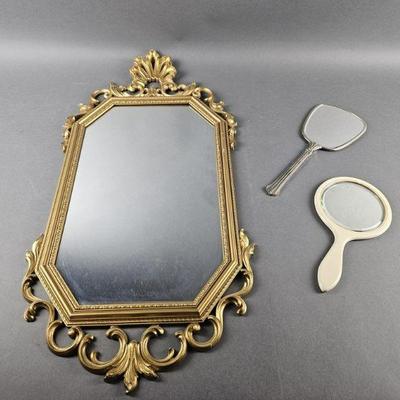 Lot 423 | Vintage Gold Syroco Wall Mirror & Hand Mirrors