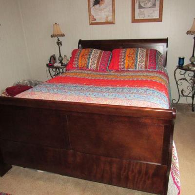Queen bed with headboard, footboard, frame, mattress and box springs