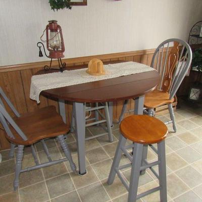 Cute kitchen table with 2 chairs and 2 stools